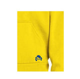 Detalle bolsillo sudadera de punto con capucha amarilla
